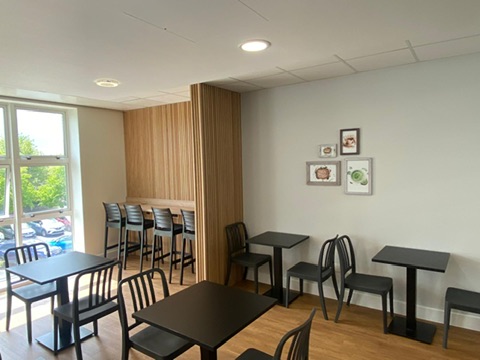Bar seating area with timber slat feature wall