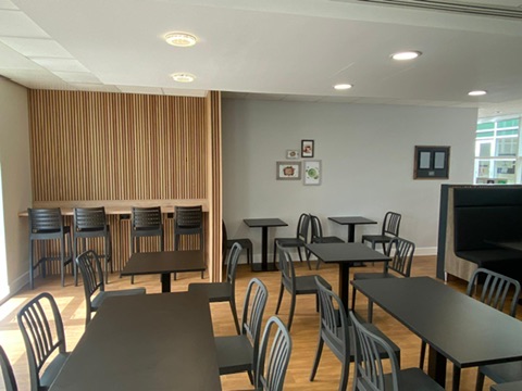 Dining area with timber slat feature and bar stools