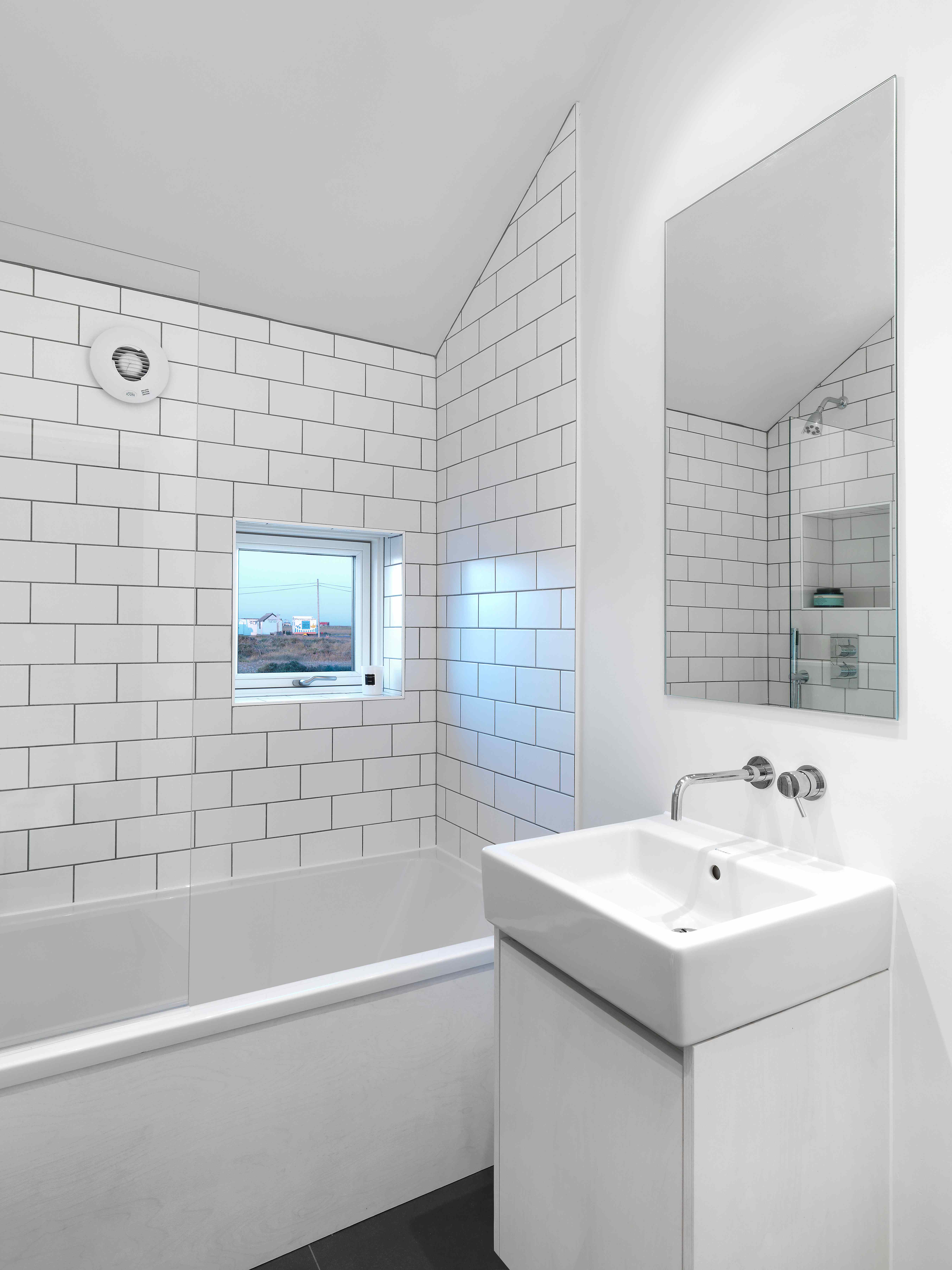 Modern white bathroom with subway tiles