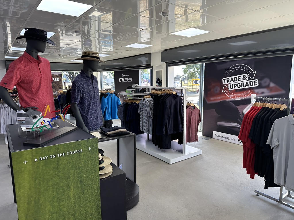 Golf clothing section with mannequin displays