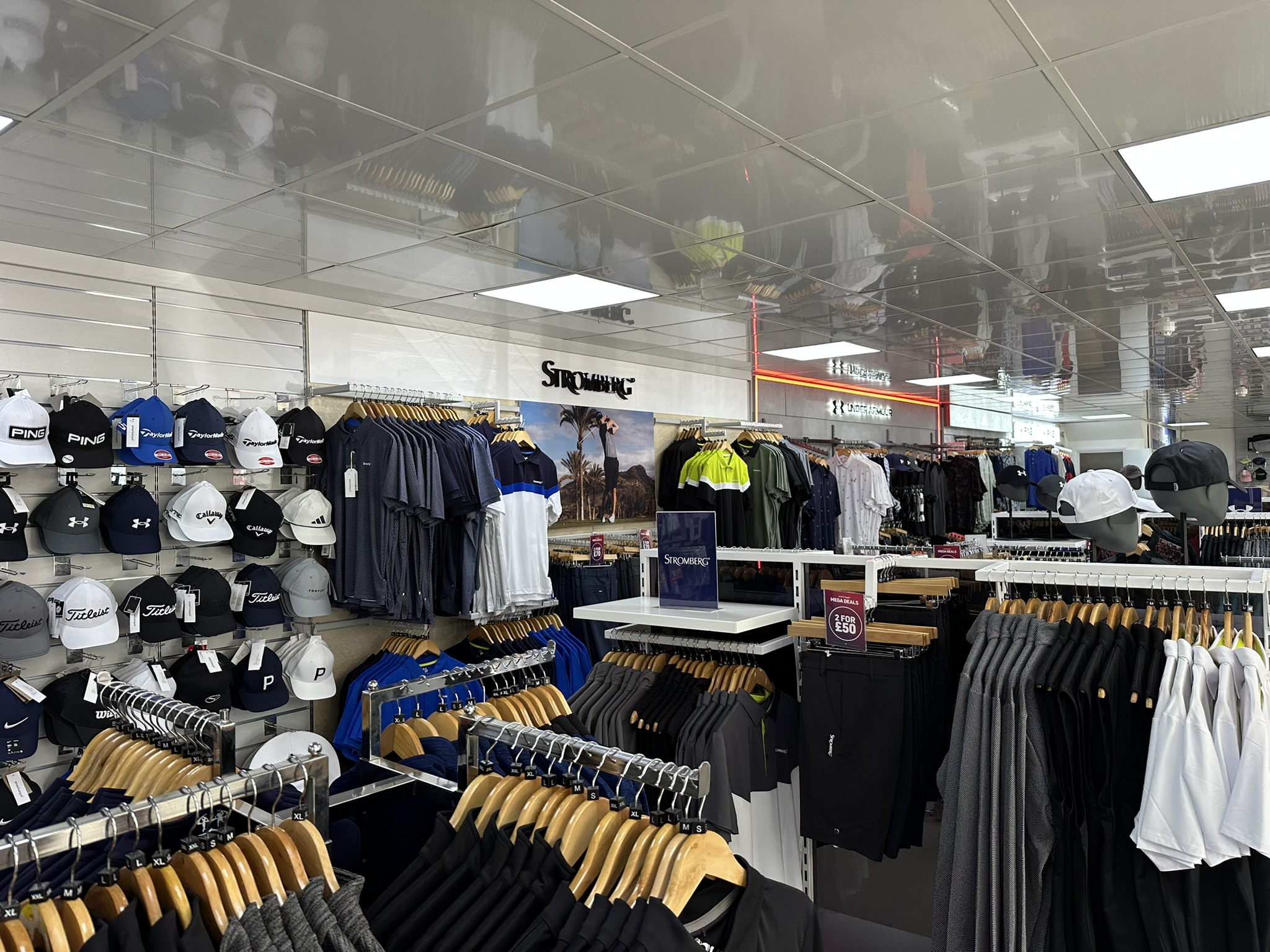 Stromberg section with branded caps and clothing rails