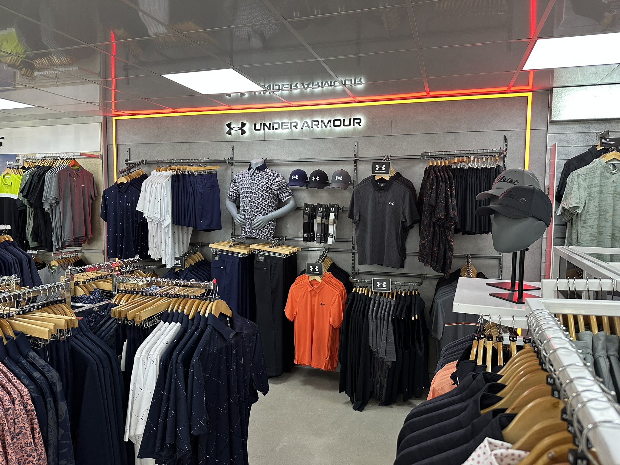 Under Armour branded clothing section
